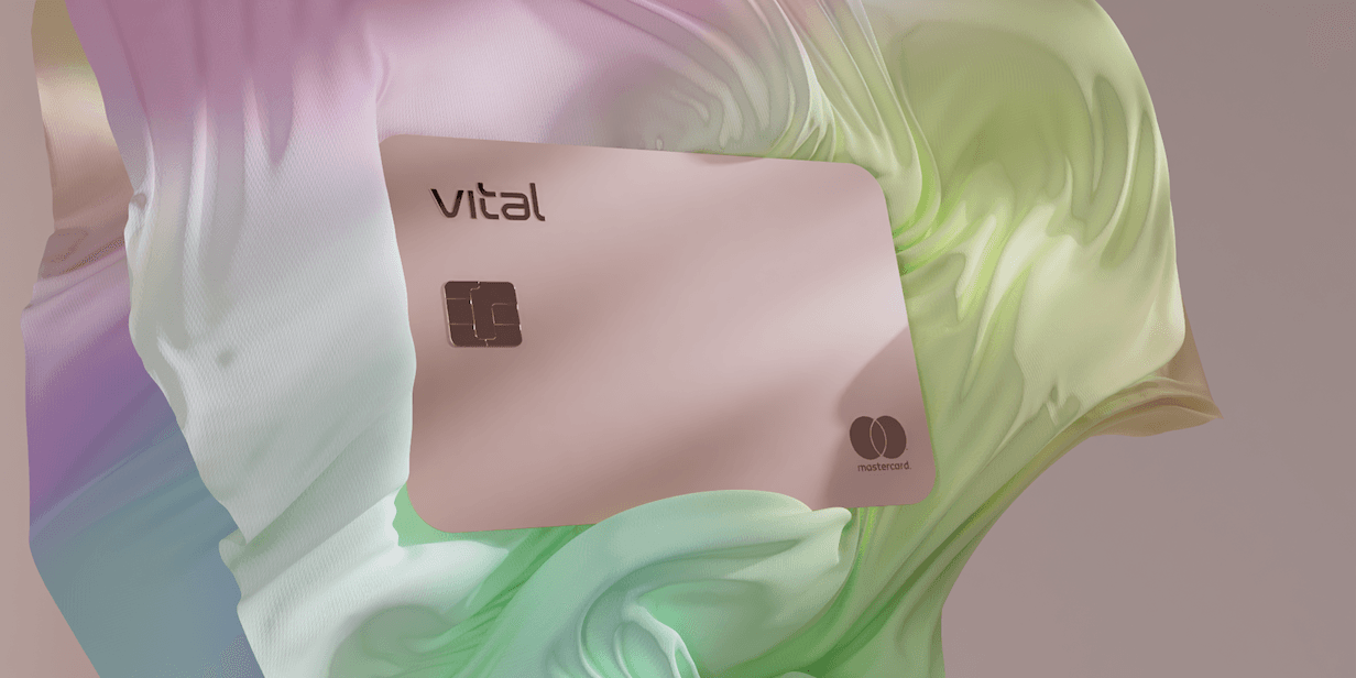Rose gold Vital Card against a fluid, multicolored pastel background