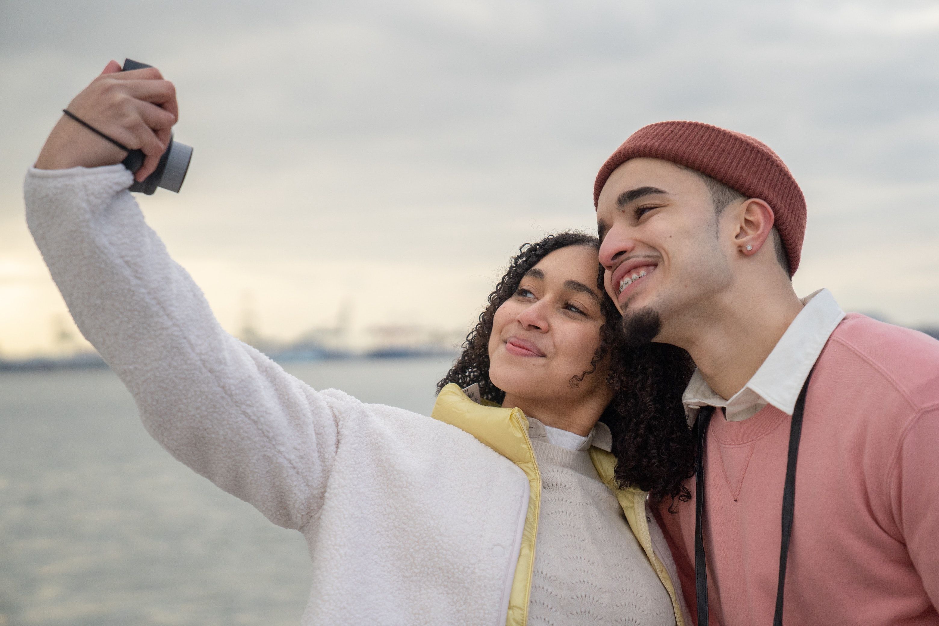 Couple takes selfie at the seaside